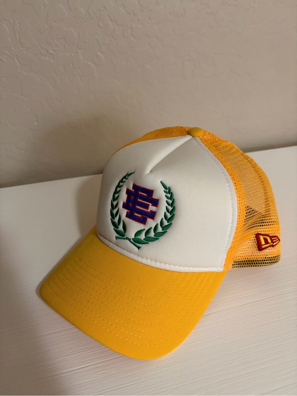 Limited. NWOT! New Era x Eric Emanuel Yellow Trucker Hat. Embroidered Crest